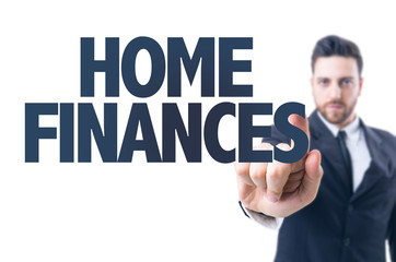Business man pointing the text: Home Finances