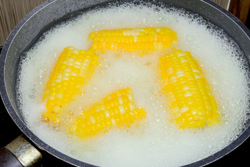 corn boiling in pot