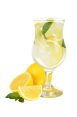 Lemons in a glass with water isolated on white