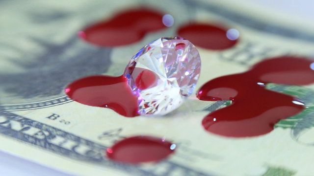Diamond, money and drops of blood