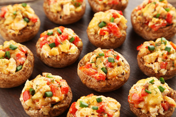 Stuffed mushrooms on cutting board