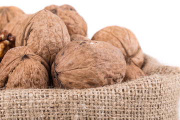 Walnuts in burlap bag.
