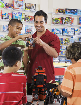 Multi-ethnic children playing in toy store