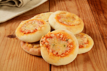 Mini cheese pizzas