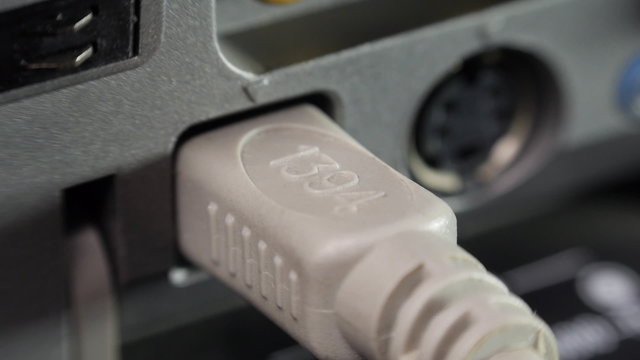 Firewire IEEE 1394 connect in DV recorder and pull out. 