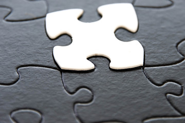 black and white puzzle pieces