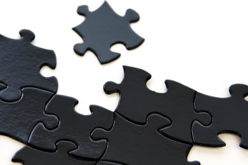 Obraz premium black and white puzzle pieces