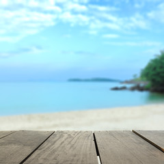 Naklejka na ściany i meble Defocused and blur image of beautiful golden sand beach with blu