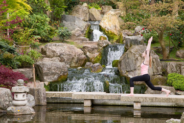 Fototapeta na wymiar young woman practising yoga