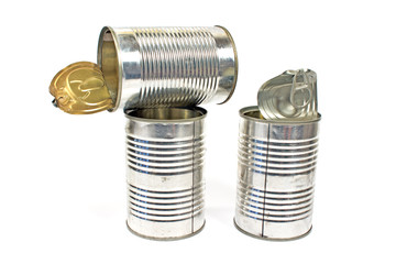 Three open empty tin can isolated on white