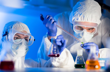 close up of scientists making test in lab