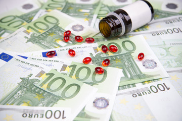 Tablets on a background of money