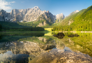 Fototapeta na wymiar mountain lake in the Italian Alps