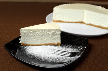 Cheesecake on a dark background