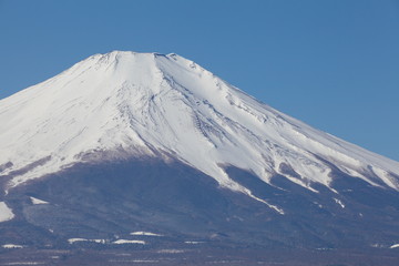 Fototapeta na wymiar Top of Mountain Fuji with snow in winter season