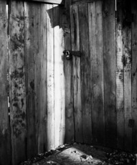 Locked Wooden Door in Sunlight