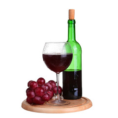 Fototapeta premium wine glass with red wine, bottle of wine and grapes