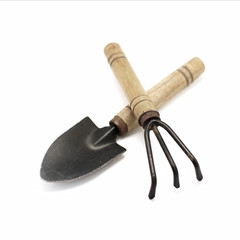 old gardening tools spade and rake