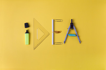 idea written with office supplies