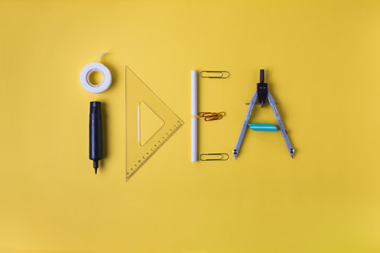 idea written with office supplies