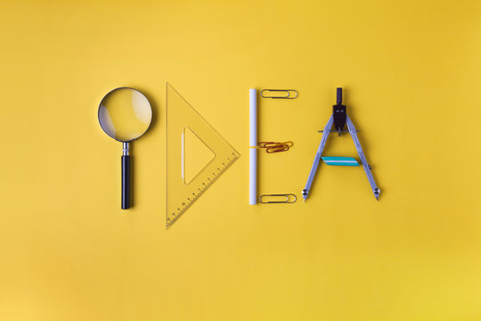 idea written with office supplies