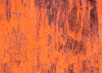 red rusty surface with peeling  paint