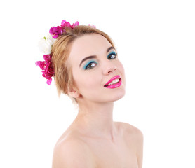 Naklejka na ściany i meble Portrait of young woman with flowers in hair isolated on white