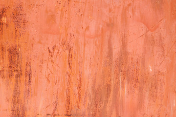 red rusty surface with peeling  paint