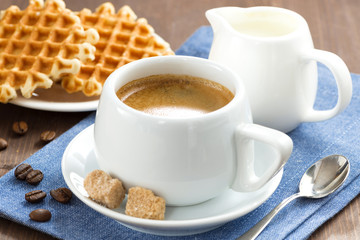 breakfast with coffee, waffles and honey, close-up