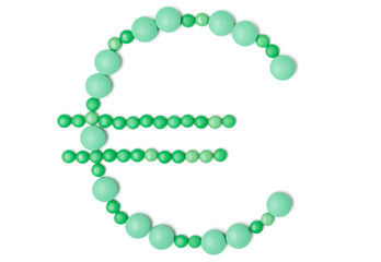 Euro sign of tablets, isolated. Concept of business on drugs.