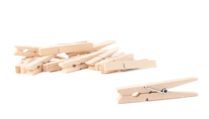 Wooden clothespin composition isolated