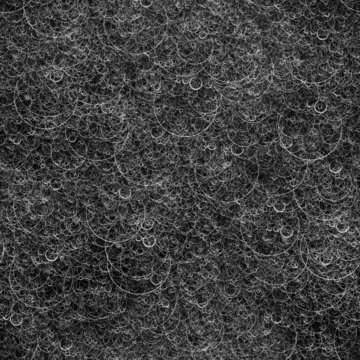 Abstract seamless black and white pattern with circles.