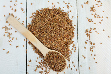 quinoa in a wooden spoon