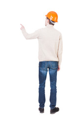 Back view of  pointing young men in helmet.