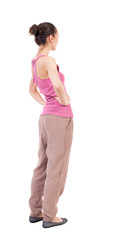 back view of standing young beautiful  woman.