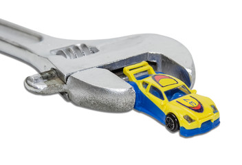 Adjustable wrench and a toy car