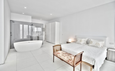 White bedroom in the modern villa
