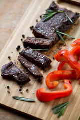 Close-up of sliced well-done grilled machete beef steak