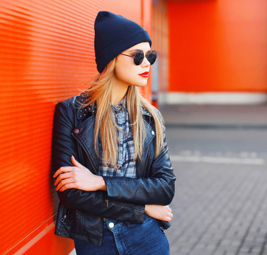 Street fashion concept - stylish woman in rock black style again