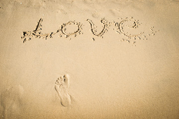 love message written in sand