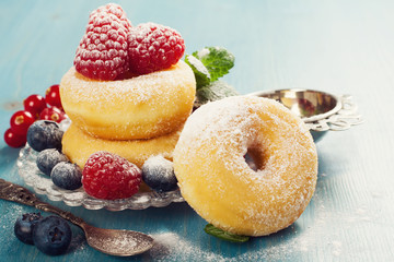 Morning breakfast with mini donuts and berries