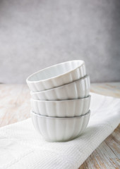 Empty white bowl on the kitchen table