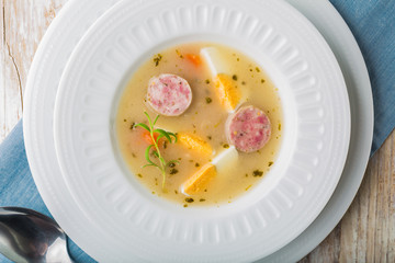Borscht with eggs and white sausage.(Polish easter soup)