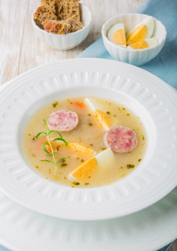 Borscht with eggs and white sausage.(Polish easter soup)