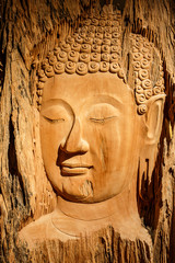 Fototapeta na wymiar Buddha carved wood