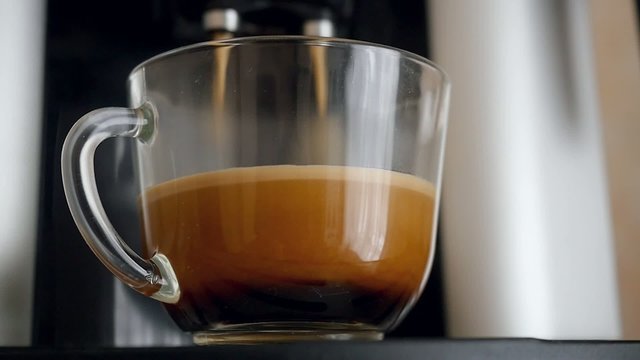 coffe dispenser with cup of coffee. Timelapse speed up