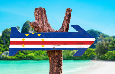 Cape Verde Flag wooden sign with beach background