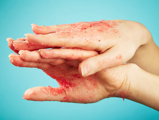 Female hands in body scrub