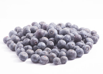 Heap of blueberries on white background.