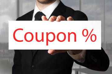 businessman holding sign coupon percentage symbol